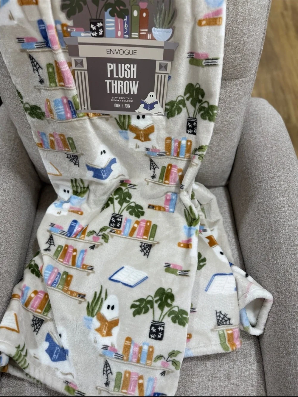 Envogue Cream Plush Throw Blanket with Ghosts, Books & Plants